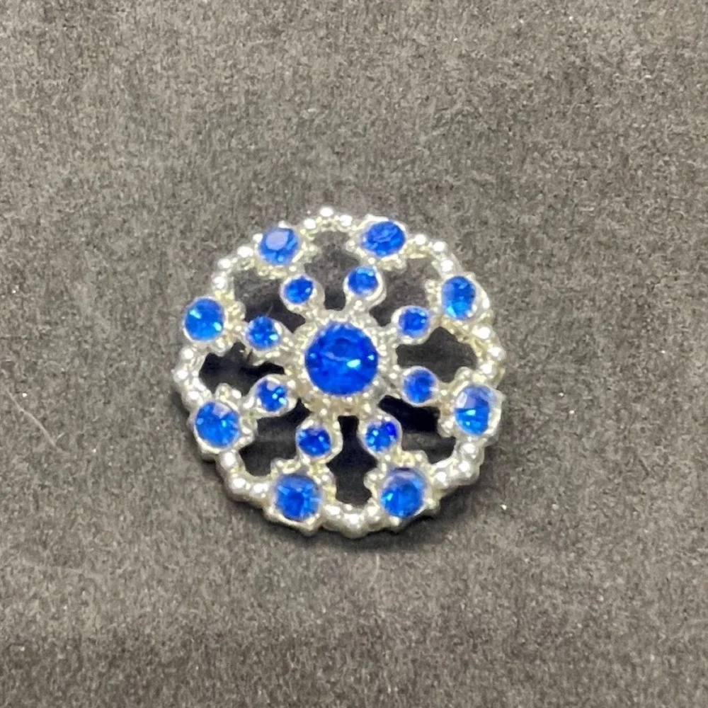 Vintage Silver Tone Blue Rhinestone Filigree Sunburst Round Brooch Pin 1.25